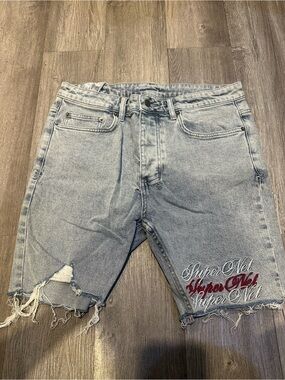 Ksubi Light Blue Distressed Denim Shorts with Red Script Embroidery